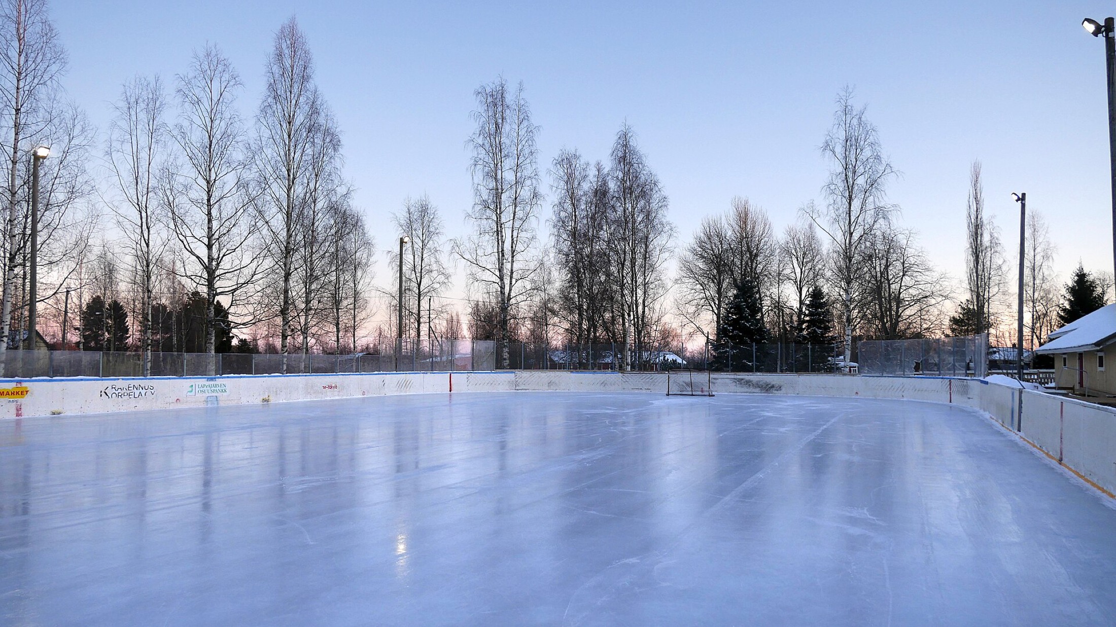 Ice maintenance preparation beside the rink floor